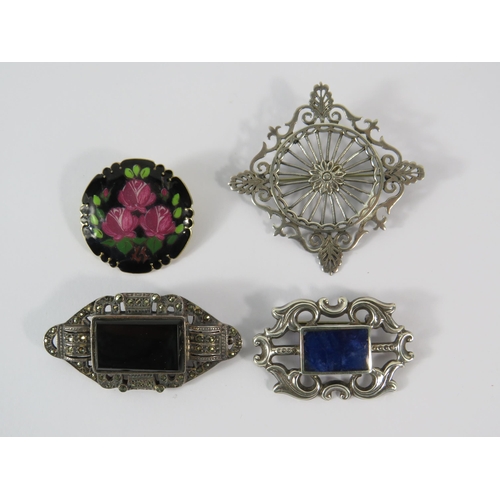 350 - Four Sterling silver vintage brooches, Whitby Jet, lapis, scottish silver and a Norwegian silver and... 