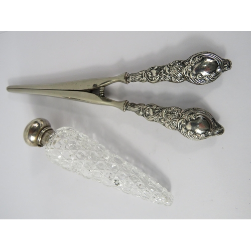 370 - A pair of sterling silver handled glove stretchers Birmingham 1911 & A scent bottle with sterling si... 