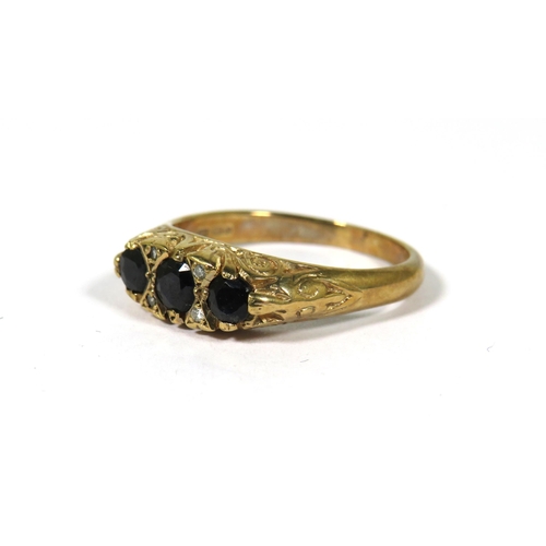 374 - 9ct Yellow Gold Gypsy Style Ring set with Three Sapphires with fancy scrolled mount. Finger size Q-5... 