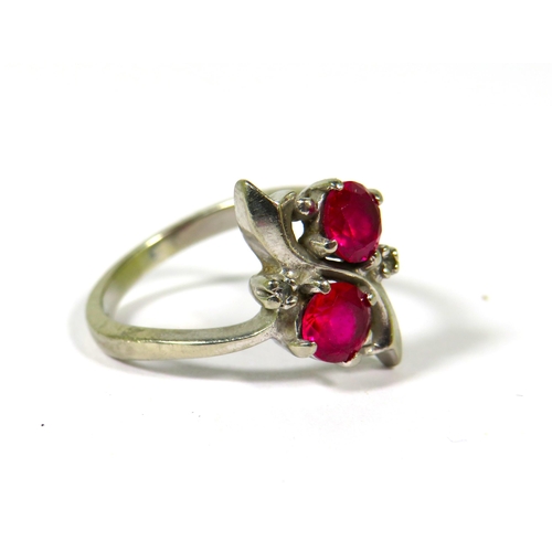 376 - Very Pretty Ring marked 10k set with two 5mm Rubies. Finger size N-5    3.4g