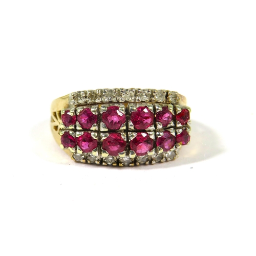 378 - Heavy Yellow Gold Statement Ring set with Two rows of Graduated Rubies with Diamond cluster surround... 