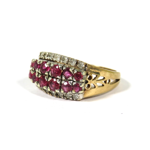 378 - Heavy Yellow Gold Statement Ring set with Two rows of Graduated Rubies with Diamond cluster surround... 