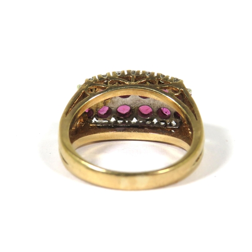 378 - Heavy Yellow Gold Statement Ring set with Two rows of Graduated Rubies with Diamond cluster surround... 