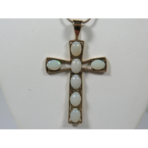 379 - Large 9ct Yellow Gold Crucifix set with Seven oval opaque opals. 50mm x 30mm   4.5 total weight. See... 