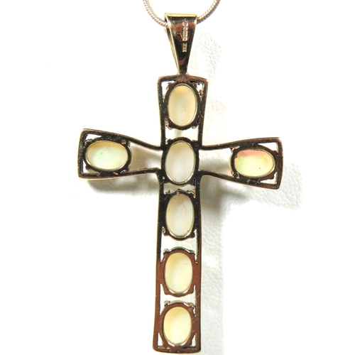 379 - Large 9ct Yellow Gold Crucifix set with Seven oval opaque opals. 50mm x 30mm   4.5 total weight. See... 