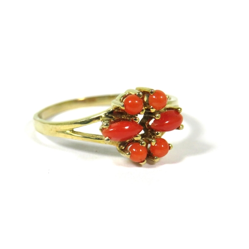 382 - 9ct Yellow Gold Ring set with Coral in a Geometric pattern. Hallmarked for London 1982 Finger size N... 