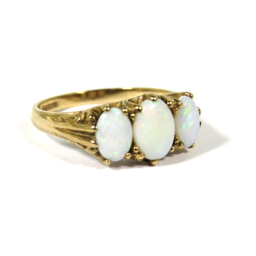 385 - 9ct Yellow Gold Ring set with a Trio of Graduated Opals.  Finger size N-5   2.5g