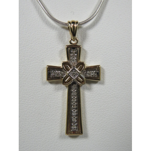 386 - 9ct Yellow Gold Celtic Style Crucifix Pendant which is set with multiple Melee Diamonds. Cross measu... 