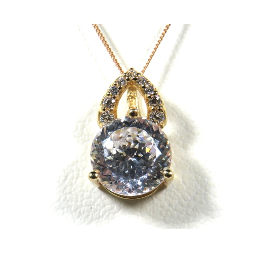 387 - 14Ct Yellow Gold Pendant set with a 8mm CZ Gemstone attached to an 18 inch 9ct Yellow Gold Trace cha... 