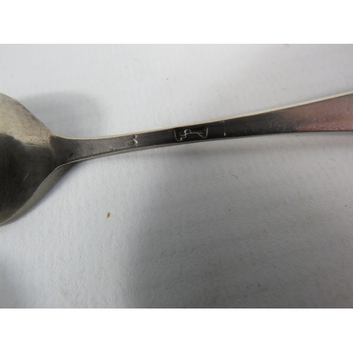 403 - Two Georgian silver teaspoons and one Russian silver teaspoon, total silver weight 54.3 grams.