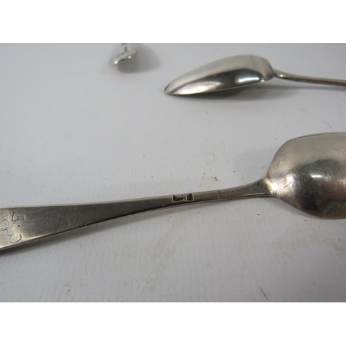 403 - Two Georgian silver teaspoons and one Russian silver teaspoon, total silver weight 54.3 grams.