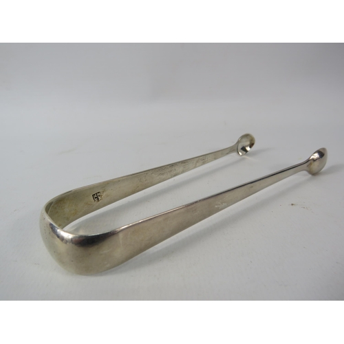 405 - Georgian sterling silver sugar tongs 30.4 grams.