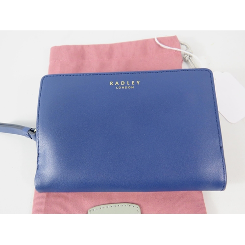 417 - Ladies Stay Magical Radley leather purse appears to be unused with dust cover.