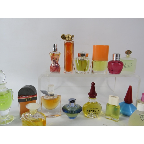 428 - 25 Womens miniature fragrances including Gucci, Christion Dior, Lancome, Givenchy etc.