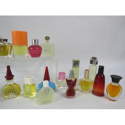 428 - 25 Womens miniature fragrances including Gucci, Christion Dior, Lancome, Givenchy etc.