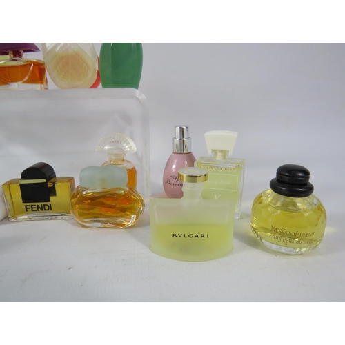 429 - 25 Womens miniature fragrances including Estee lauder, Givenchy, Hemes etc.