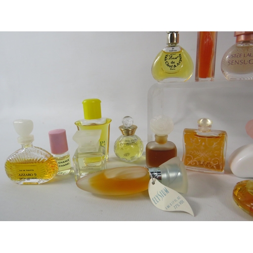 429 - 25 Womens miniature fragrances including Estee lauder, Givenchy, Hemes etc.