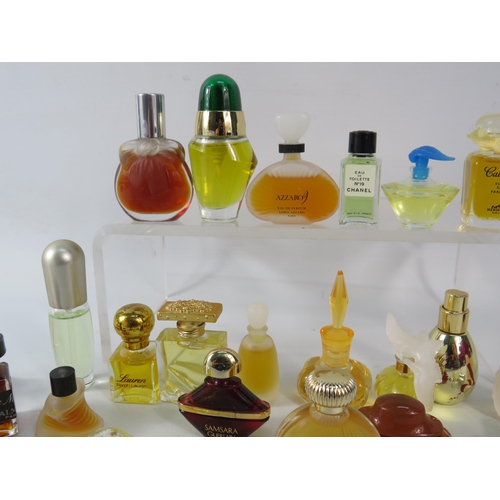 432 - 25 Womens fragrances all miniatures see photos.