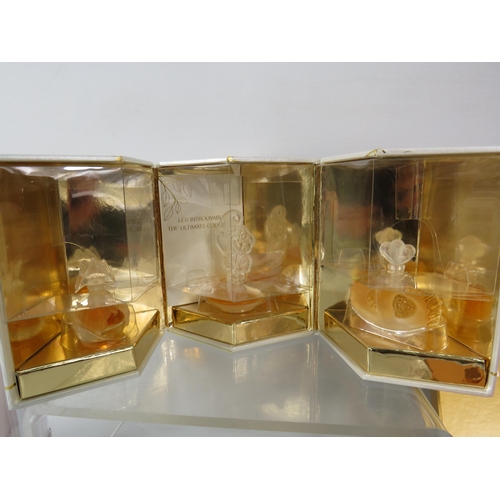 434 - Miniature fragrance gift sets by Givenchy, Vivenne Westwood and Lalique.