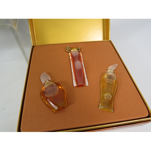 434 - Miniature fragrance gift sets by Givenchy, Vivenne Westwood and Lalique.