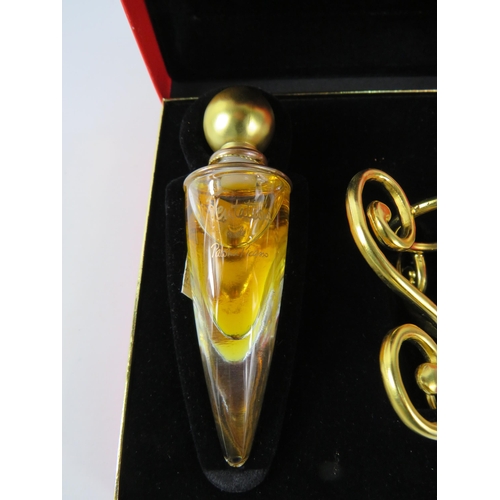 435 - Tentations by Paloma Picasso Parfum with original box and stand.