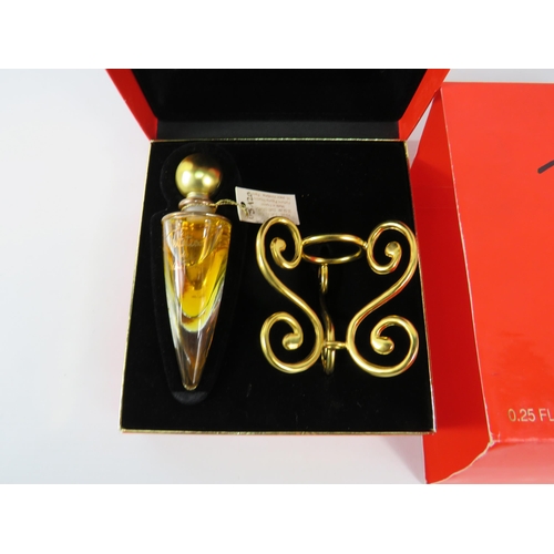 435 - Tentations by Paloma Picasso Parfum with original box and stand.