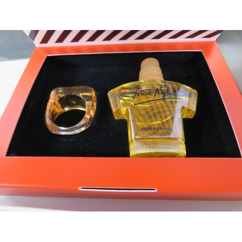 439 - Boxed parfums sets by Kenzo and Sonia Rybiel.