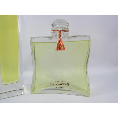 440 - Two Large shop display Perfume bottles Gucci Envy & Hermes 24 Faubourg.