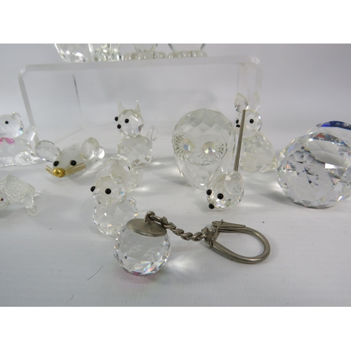 464 - Large selection of glass figurines by Swarovski, Galway etc.