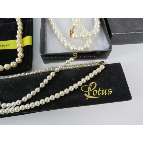 475 - Pearl necklaces by Carolina Herrera, Napier and Lotus.