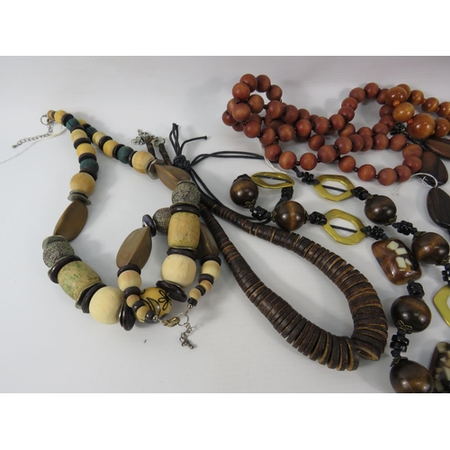 479 - Selction of wooden statement necklaces.