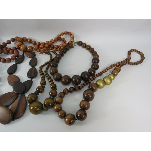 479 - Selction of wooden statement necklaces.