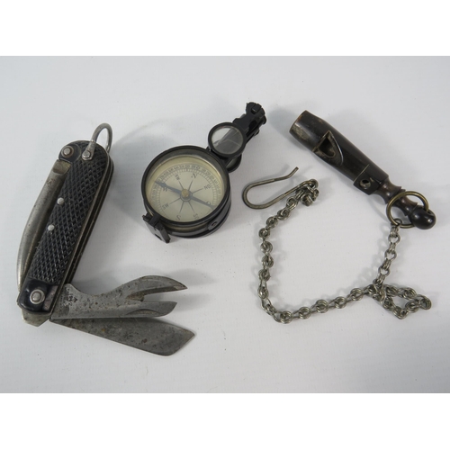 484 - Interesting mixed lot to include a arrow marked 1942 pen knife, compass with mirror & a whistle.