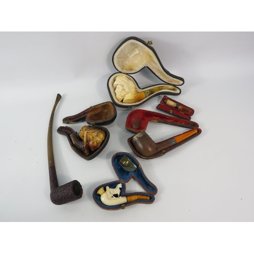 494 - Good selection of smokers pipes including three Meerschaum and one which is hand finshed with sterli... 