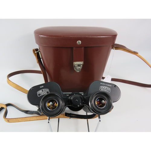 496 - Pair of Carl Zeiss Jenoptem 10 x 50 binoculars with case.