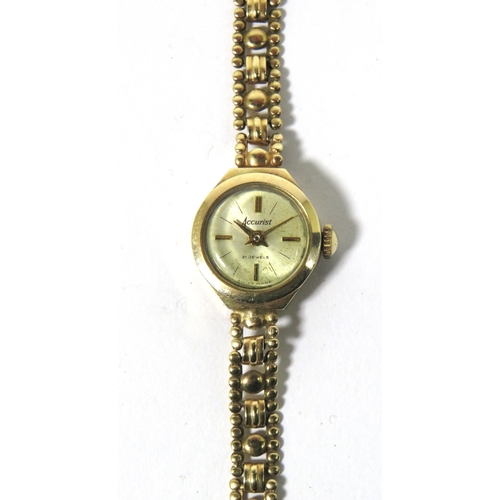 400 - Ladies Accurist 21 Jewel swiss watch, In running order. 9ct Gold Body and Strap. Total weight 10g