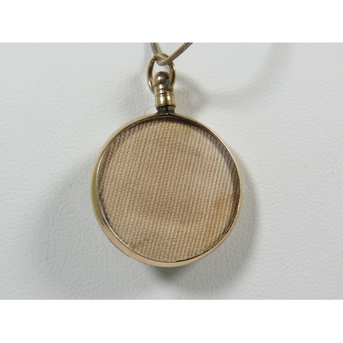 503 - Edwardian era Glass locket with 9ct Gold body which is hallmarked for Birmingham 1904, Measures appr... 