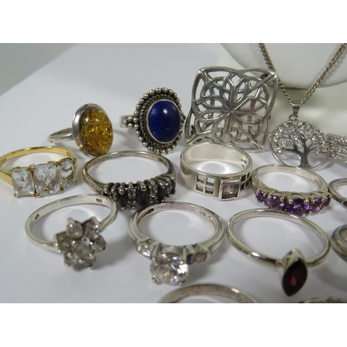 520 - Great Selection of 925 Stone set Silver rings along with a weave Silver Brooch and two pendants on S... 