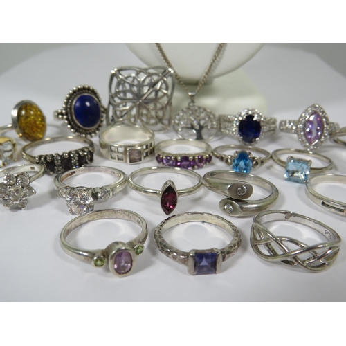 520 - Great Selection of 925 Stone set Silver rings along with a weave Silver Brooch and two pendants on S... 