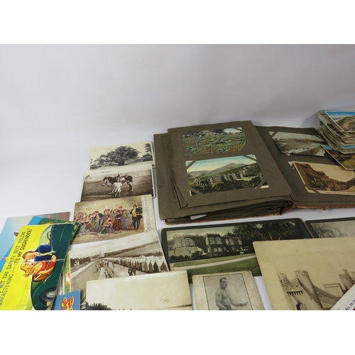 530 - Album of vintage topographical postcards plus a large selection of loose postcards including Bamfort... 