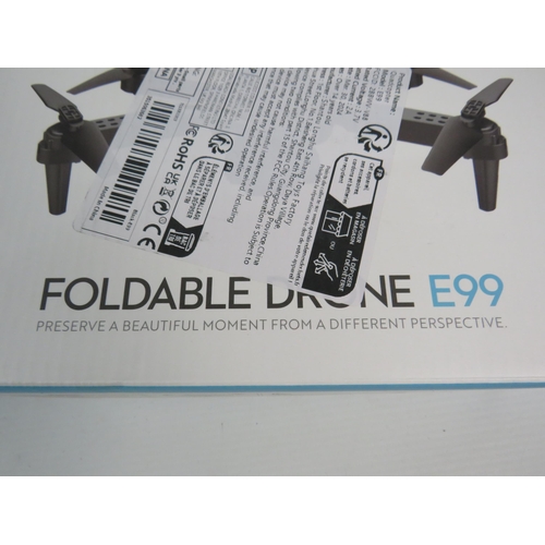 537 - E99 Foldable Quadcopter drone unused in the box.