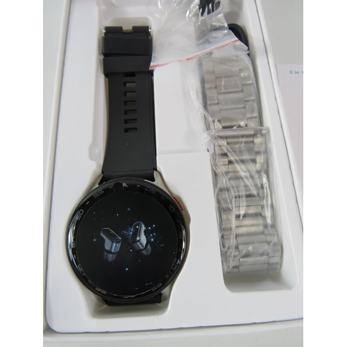 557 - New in the box 2 in one smart watch with ear buds.