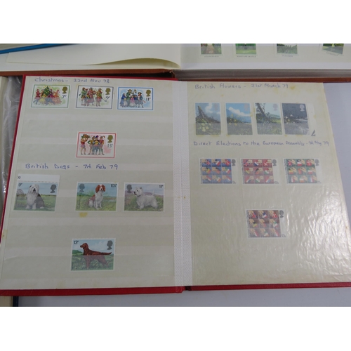 575 - Three albums containing a large quantity of mint stamps and two part filled used stamp albums.