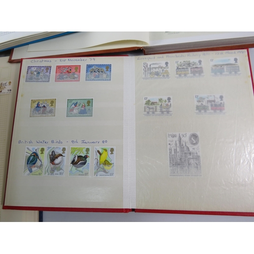 575 - Three albums containing a large quantity of mint stamps and two part filled used stamp albums.