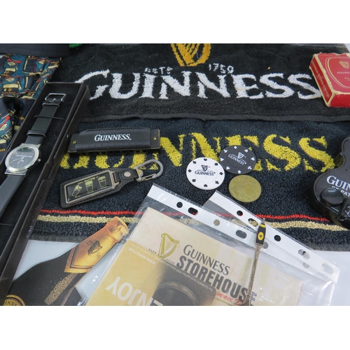 579 - Selection of Guinness collectable items, beer mats, watch, hat etc.