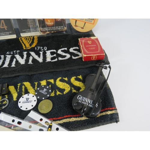 579 - Selection of Guinness collectable items, beer mats, watch, hat etc.