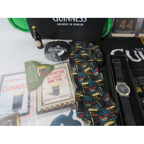 579 - Selection of Guinness collectable items, beer mats, watch, hat etc.