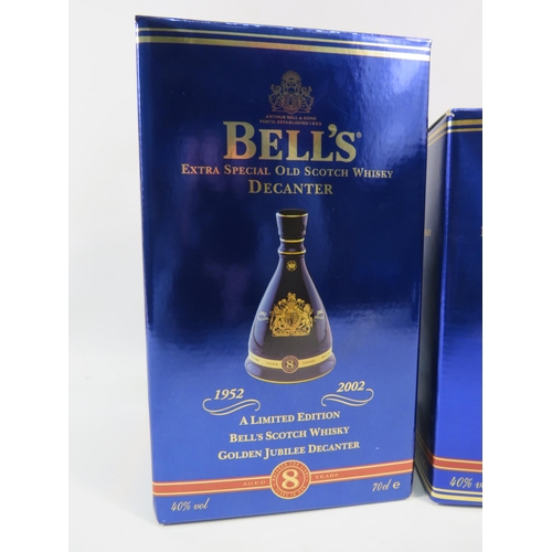 596 - Two Bells whiskey full decanters, Royal commemortive Golden Jubilee and Prince of Wales 50th birthda... 