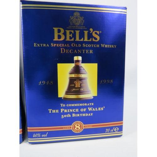 596 - Two Bells whiskey full decanters, Royal commemortive Golden Jubilee and Prince of Wales 50th birthda... 