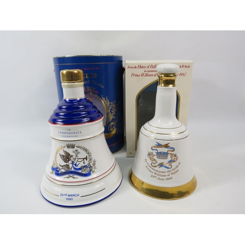 598 - Two Full Commemorative Royal Bells whiskey decanters. (One has cellophane seal one does not)with tin... 